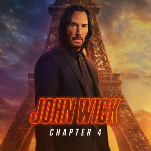John Wick posing in front of Eiffel tower